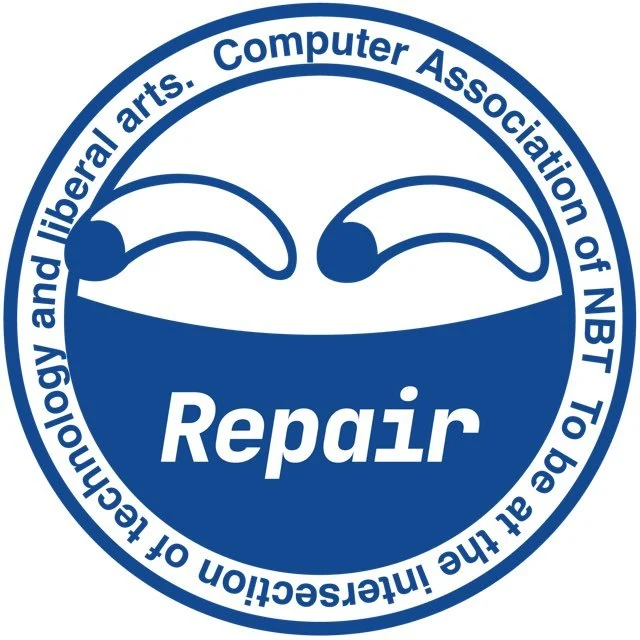 同款深蓝色圆徽,下半部深蓝底上写着白色的“Repair”